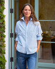 Frank & Eileen Oona Button-Up Shirt styled with jeans, worn casually in a bright doorway for a relaxed, modern look.