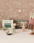 Maileg Cooking Set with three toy mice, kitchen utensils, and whimsical fried egg wall art in playroom setting.