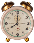 Maileg powder alarm clock shows 8:00, a charming accessory for Mouse Hole Farmhouse dollhouses.