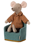 Maileg stuffed mouse in brown polka-dot shirt sitting on yellow-trim Maileg folding chair, playful nursery decor.
