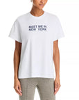 White 100 cotton Rag & Bone Giovanni tee featuring MEET ME IN NEW YORK printed in blue text.