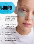A person wears translucent under-eye masks beside a blue Faire Hyper Eyes Mask. Text highlights benefits: depuff, soften dark spots, even complexion, revive dull skin, and brighten eyes for an instant under-eye refresh.