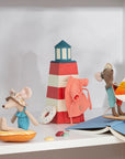 Maileg Mum & Dad Mouse in coral bathrobes lounging seaside with nautical decor, by Bungalow Furniture & Accessories.