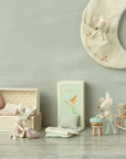 Maileg Tooth Fairy Mouse with small furniture and moon decor in a matchbox, perfect for nursery decor.