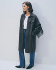 Bungalow Furniture & Accessories fringe sleeve coat in dark gray merino wool cashmere blend, worn with jeans and tee.
