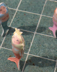 Faire’s Dive Buddies Melody the Mermaid Multi Set of 3 features colorful mermaid figures that stand upright on pool tiles, perfect for water play and encouraging children’s diving skills in the sun.