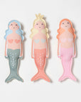 The Faire Dive Buddies Melody the Mermaid Multi Set of 3 features plush mermaid dolls in pastel blue/green, yellow/peach, and orange/pink with heart details—fun companions for water or pool play.