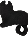 Black cat-shaped pillow with curled tail and upright ears, Bungalow Furniture & Accessories, black on white background.