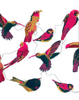 Colorful paper bird garland by The Faire, illustrated birds on white, strung together for playful decor.