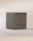 Gray Dirty Girl Martini box by Faire featuring illustration of a woman in a martini glass.