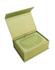 Rupi Kaur's Writing Prompts Gratitude by Simon & Schuster Inc. comes in a light green box with a hinged lid. Inside is a matching card with white borders and printed text, perfect for gratitude journaling. The interior matches the exterior’s green shade.