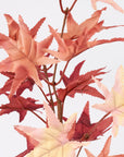 Beige faux maple floral pick on brown stems by Faire, perfect for fall decor at Bungalow Furniture & Accessories.