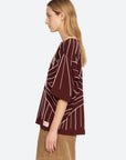 Maroon Sea New York Quinn beaded T-shirt with geometric white pearl detailing and a relaxed dropped shoulder fit.