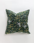 The North Oaks Pillow by Norwalk features a detailed green and yellow leafy tree pattern on a light fabric cover—an elegant touch to enhance your pillow collection.