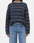 CLOSED striped crew neck jumper and light blue jeans, casual style, white background, Bungalow Furniture & Accessories.