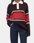 CLOSED Polo with rugby stripes styled with blue jeans and a white shirt for a fresh, modern color-blocked look.