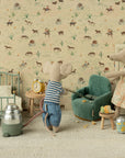 Maileg Folding Chair with Maileg friends, set in a cozy dollhouse room with patterned wallpaper, playful and whimsical style.