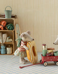 Dotted metal Maileg Wagon packed with miniature camping gear and two toy mice.