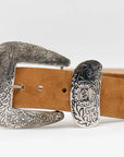 Tan Italian suede Western belt featuring a large, handcrafted antique silver buckle and matching tip.