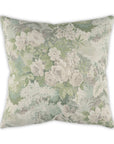 The Daphne Pillow by Moss Studio features a square shape with painterly light green, beige, and white floral designs on linen-look textured fabric, showcased against a white background.