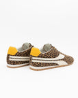 The ONCEPT Essex Sneaker features a leopard print, cream accents, yellow heels, and light brown soles in premium Italian calf suede—ultra-lightweight and shown against a white background.