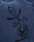 Blue unisex raglan shirt featuring a black line drawing of dancing Snoopy, Free City BasicGoodness Schulz.