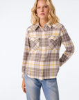 Beige, grey, and yellow plaid cashmere KUJTEN Lumber L/S Shirt with blue jeans against a plain background.