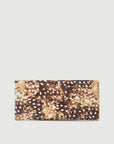 Staud Muse Clutch in brown and tan cow leather with a spotted animal print, ideal for evening outings.