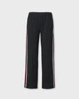 Black Irina Ponte Track Pant with elastic waistband and burgundy and white side stripes.