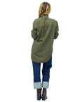 Kerri Rosenthal Jack Flannel Shirt in plaid, styled with rolled cuff jeans and brown boots, casual back view.