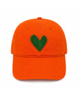White velvet cap with green heart patch on front, Kerri Rosenthal KR Imperfect Velvet Heart Hat.