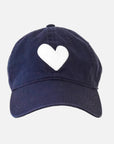 The KR Imperfect Heart Hat by Kerri Rosenthal is a navy blue baseball cap featuring a large embroidered heart patch on the front, displayed against a plain white background.