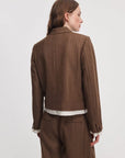 Lawrence crop blazer in brown herringbone pinstripe, back view.