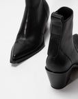 Close-up of the ONCEPT Nashville Boot—women's genuine leather ankle boots with pointed toes, chunky heels, and a stitched pull tab—set against a white background.