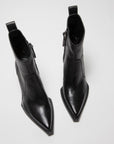 The ONCEPT Nashville Boot—black, genuine leather ankle boots with pointed toes, side zippers, and pull tabs—displayed on a light surface.