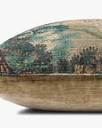 The Loloi Rugs Green/Multi 22x22 throw pillow features a tapestry-like landscape design in soft blue, green, and tan tones with a knife edge and hidden flap zipper, shown side profile on a plain white background.