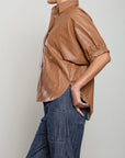 Pharaoh Claude brown button down shirt paired with blue jeans, casual style by Bungalow Furniture & Accessories.