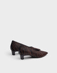Zebra-patterned calf hair pointed-toe pumps with mid heels and OrthoLite insoles by Rag & Bone.
