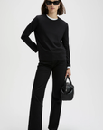 Sold Out NYC Long Sleeve Perfect Tee in black styled with sunglasses and accessories for a modern city look.