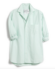 The Shirley Oversized by Frank & Eileen is a light green and white striped, oversized button-up shirt with long rolled sleeves, a chest pocket, and a collar. Displayed on a white background.