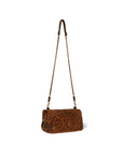 The Bobi Bag by Jerome Dreyfuss is a rectangular goatskin bag with a brown and black leopard print, gold-tone hardware, and an adjustable chain and leather shoulder strap.