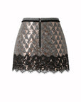 Le Superbe Pyramid Skirt in black and white zigzag with rose gold sequins, black lace hem, and back zipper.