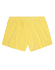 The Micro Terry Swing Short by The Great Inc.—yellow cotton shorts with an elastic waistband, vintage knit-inspired, shown flat on a white background.