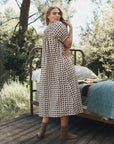The Smocked Sleep Dress in a brown bear print, a Victorian-inspired midi-length smocked sleep dress.