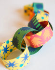 Colorful star and burst paper garland by Faire, perfect for festive birthdays, parties, or joyful celebrations.