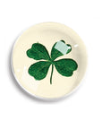 The Ben's Garden Dome Crystal Paperweight, handcrafted in New York, features a domed shape with a green four-leaf clover design and is shown on a white background.