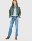 ASKK Bleecker Street Liner Jacket styled with casual denim and boots, set against a minimal white backdrop.