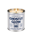 Ghostly Glow soy candle in a silver tin by Faire with cardamom, honey, and vanilla scents, perfect for Halloween ambiance.