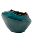 Teal ceramic Ilaria Medium vase with an organic, asymmetric shape and jagged rim by Bungalow Furniture & Accessories.
