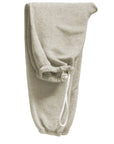 The BASIC GOODNESS OG SWEATPANTS by Free City (sparrow, LLC) are light gray French terry pants with an elastic waistband, white drawstring, and elastic cuffs—offering classic comfort and style for everyday wear.